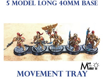 May include: A 5 model long movement tray with a 40mm base. The tray is black and has five circular slots for miniature figures. The tray is designed to hold miniatures with 40mm bases. The tray is made of plastic and is designed to be used with miniature wargames.