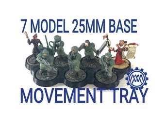May include: A 7 model 25mm base movement tray with a gear logo. The tray is black and has seven circular spaces for miniature figures. The figures are painted in various colors, including green, red, and brown.