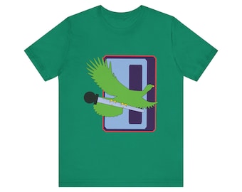 May include: Green t-shirt featuring a graphic of a green bird with a microphone, set against a blue and purple rectangular design. The bird is in flight, with its wings spread. The shirt is made of a soft material.