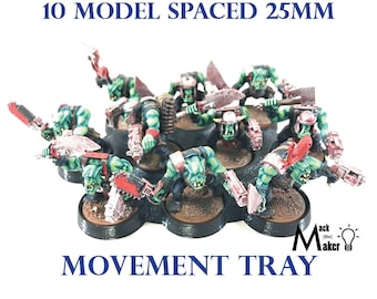 May include: A 10 model movement tray with 25mm spacing for miniature wargaming. The tray is black with brown bases and features green and red painted orcs.
