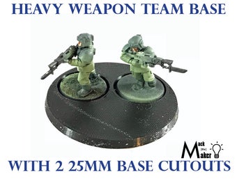 May include: A black 3D-printed base with two 25mm cutouts, holding two miniature soldiers in green uniforms, each armed with a rifle. The text "HEAVY WEAPON TEAM BASE" and "WITH 2 25MM BASE CUTOUTS" are printed on the image.