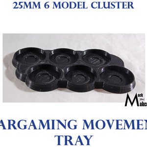 May include: A black plastic tray with six 25mm diameter circular depressions for holding miniature models. The tray is designed for use in wargaming and is labeled "Wargaming Movement Tray".