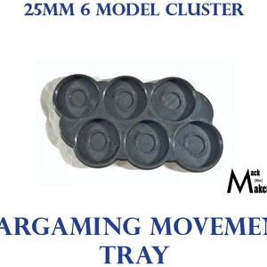 May include: A black plastic tray with six circular depressions, designed for holding 25mm miniature models. The tray is labeled "25MM 6 MODEL CLUSTER WARGAMING MOVEMENT TRAY".