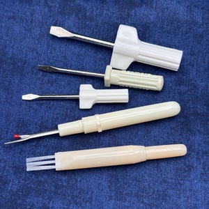 Sewing Machine Screwdriver set, brush, and seam rippers