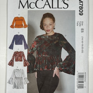McCall&#39;s M7809 Uncut FF Misses Sizes 14 - 22 Loose Fitting Pullover Top with Peplum, Sleeve and Length Variations