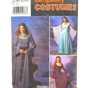May include: Simplicity Costumes sewing pattern 9891, size HH 6, 8, 10, 12. The package features illustrations of long-sleeved, floor-length dresses with flared sleeves and varied necklines, including a blue gown with a white overlay and a dark purple dress.