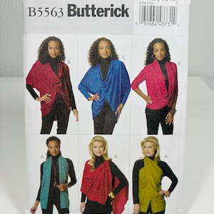 May include: A sewing pattern for a wrap top with four different variations. The pattern is from Butterick and has the number B5563 on it. The pattern is for sizes large, extra large, and extra extra large.