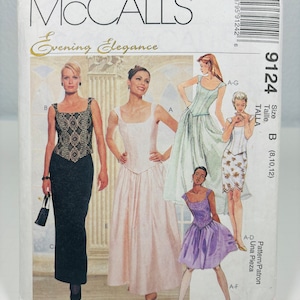 May include: McCall's Evening Elegance sewing pattern for a dress, size B (8, 10, 12). The pattern includes instructions for a one-piece dress with a fitted bodice and a flowing skirt.