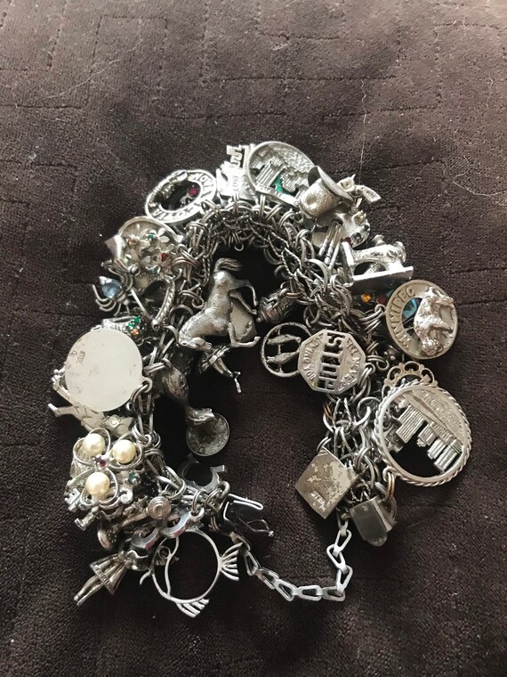 Vintage charm bracelet with 53 charms