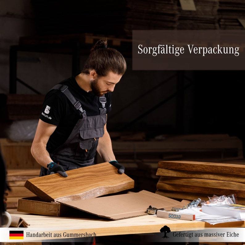 May include: A person carefully packages a wooden board in a cardboard box. The board is made of solid oak and has a natural wood finish. The text "Sorgf&auml;ltige Verpackung" is visible in the upper right corner of the image.