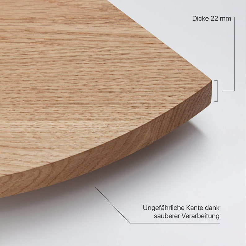 May include: Close-up of a light brown wooden shelf with a rounded edge. The shelf is 22 mm thick and has a smooth, finished edge. The text "Ungef&auml;hrliche Kante dank sauberer Verarbeitung" is visible in the lower right corner of the image.