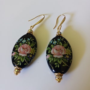 Black oval Tensha bead earrings