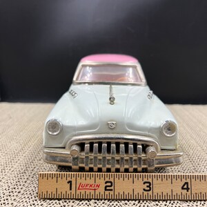 Tintin - VOITURE L'AMERICAINE ROUGE BUICK ROADMASTER DE 1949, 1/43