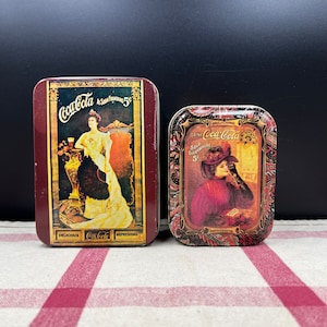 Set if 2 Vintage Gibson Girl Coca-Cola Tins