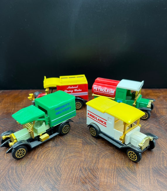 4 Piece Set Vintage Multi Colored Model T Delivery Truck