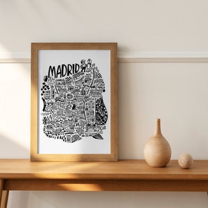 Madrid illustrated city map by sira lobo. Monochrome map of Spain's capital framed option and different print sizes. Travel wall art