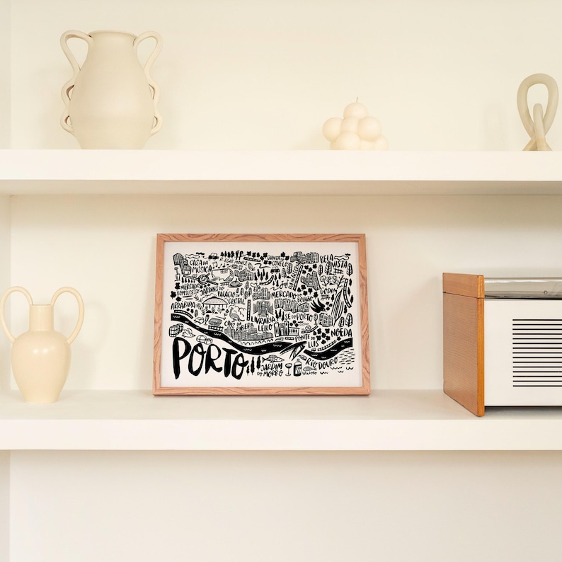 Discover Porto with this chic black-and-white illustrated map by Sira Lobo! Perfect for living room decor, available in various sizes and framing options. Ready to hang and bring a touch of Porto’s charm to your space.