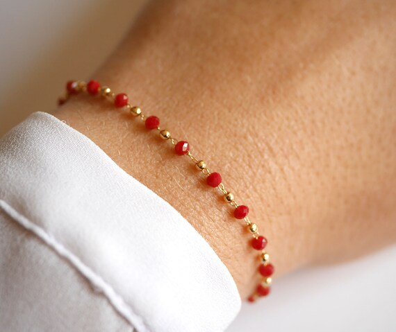 red and gold beaded bracelet