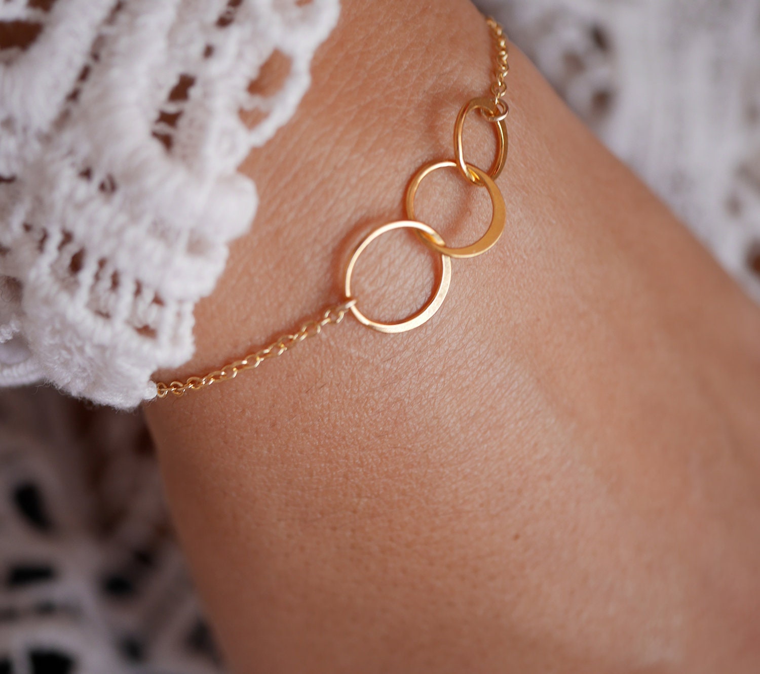Gold band bracelet store with circles