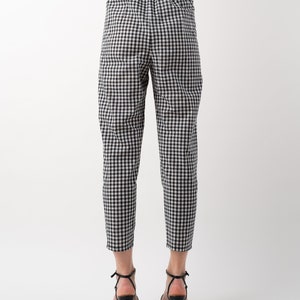 Black and white gingham print tapered leg trousers back