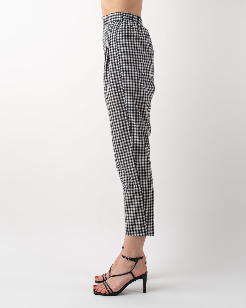 Black and white gingham print tapered leg trousers side