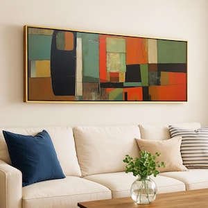 May include: A rectangular abstract painting in a thin gold frame featuring a geometric composition of blocks in shades of orange, sage green, black, brown, and cream. The artwork displays varied rectangular and square shapes with visible brushstrokes.