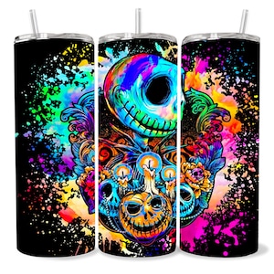 May include: Three colorful stainless steel tumblers with a black background and a colorful graphic of a skull with a Jack Skellington-like face and a floral design.