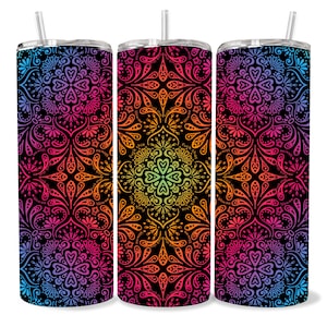 May include: Three stainless steel insulated tumblers with lids and straws. Each tumbler features a vibrant, intricate mandala design in shades of pink, purple, orange, and blue against a black background. The design is symmetrical and detailed.