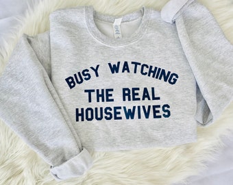 Busy Watching The Real Housewives Vintage Grey Cozy Retro Funny Sweatshirt