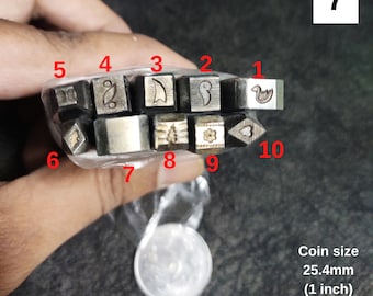 May include: Ten metal stamp heads with different designs, including a bird, a leaf, a flower, and a heart. The stamp heads are arranged in two rows, with the top row labeled 1 through 5 and the bottom row labeled 6 through 10. A coin is shown for size reference, measuring 1 inch in diameter.
