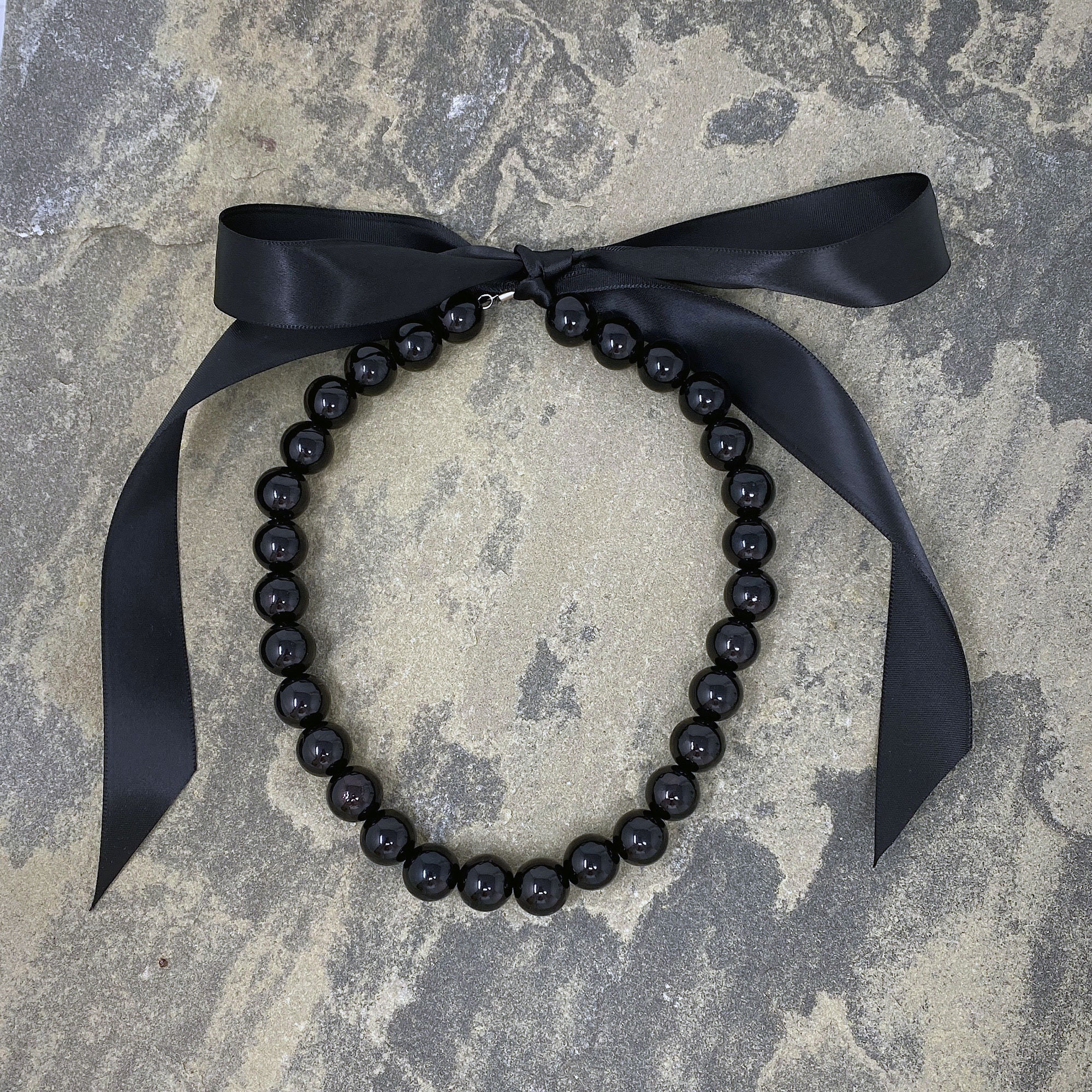 Black pearls mockup realistic style Royalty Free Vector