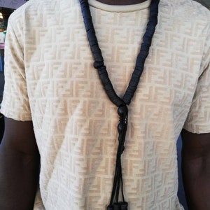 Handmade ebony wood tasbih necklace from West Africa