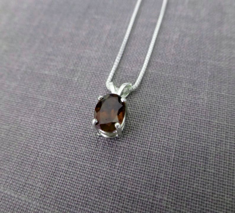 Oval Shaped 1.55 Carat Natural Rhodolite Garnet Set In 925 Sterling Silver Sun Garnet