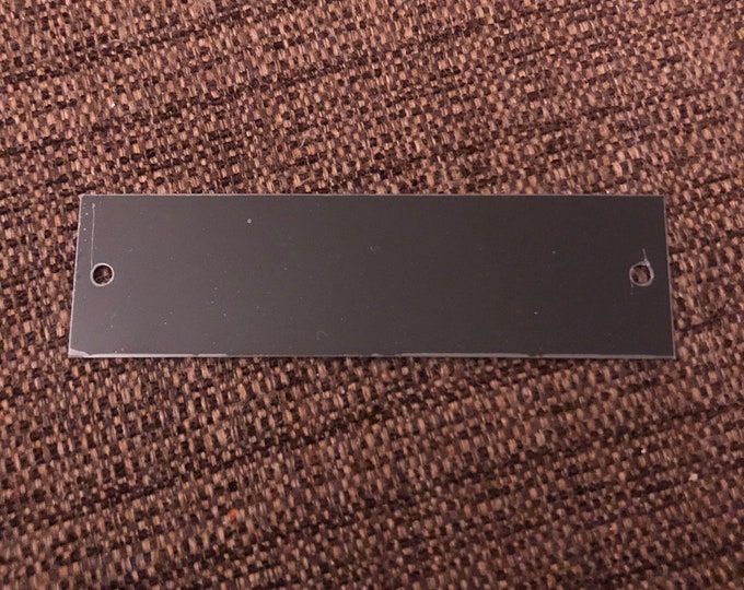 3.825”x1” Black Aluminum Rectangle with nail holes (writing is gold) - Engraved Plate (adhesive backing)