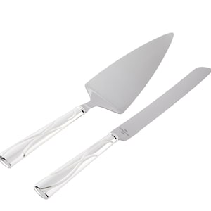 May include: A silver cake knife and server set with a swirl design on the handles. The server has a wide, flat blade and the knife has a serrated edge.
