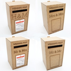 May include: Four wooden wedding post boxes. Each box is rectangular with a slot at the top and a door on the front. The text "WEDDING POST" is above the slot. One box has "H&M", another "Mrs & Mrs", and two have "Mr & Mrs". Each box has a small label.
