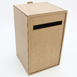 May include: A rectangular, light brown wooden mailbox with a black slot for mail. The mailbox has a small, rectangular handle on top. The design is simple and modern, with clean lines and a minimalist aesthetic.
