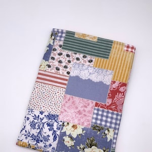 Patchwork look padded book sleeve |Quilted look padded book sleeve | Florals, stripes, and plaids