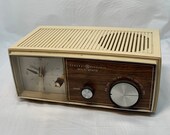 Beautiful Vintage (1960 39 s) General Electric MCM Radio Alarm Clock Tan Box with Faux Wood Face Mid Century Alarm Clock MCM Atomic Face