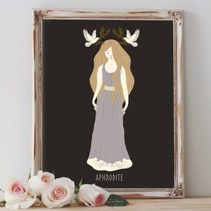 May include: A framed illustration of Aphrodite, the Greek goddess of love and beauty. She is depicted as a woman with long blonde hair, wearing a purple dress and a crown of olive branches with two white doves.
