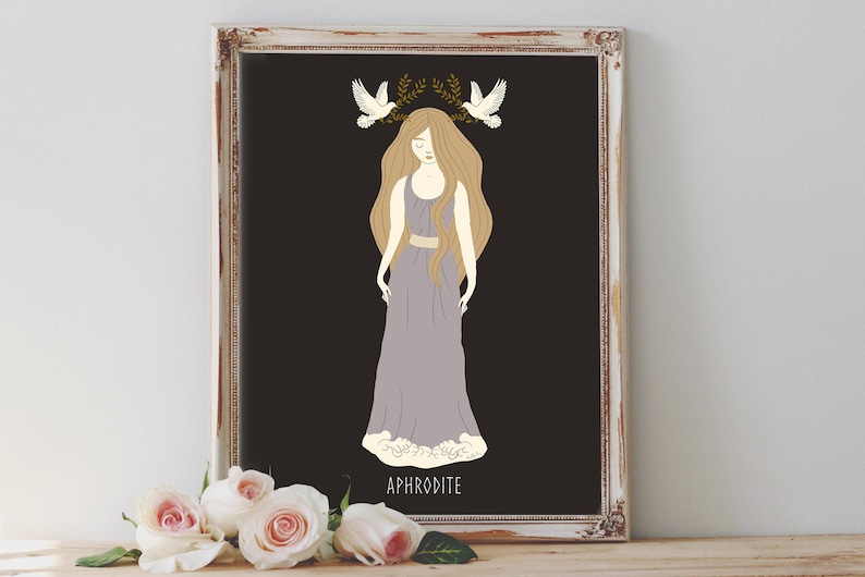 May include: A framed illustration of Aphrodite, the Greek goddess of love and beauty. She is depicted as a woman with long blonde hair, wearing a purple dress and a crown of olive branches with two white doves.