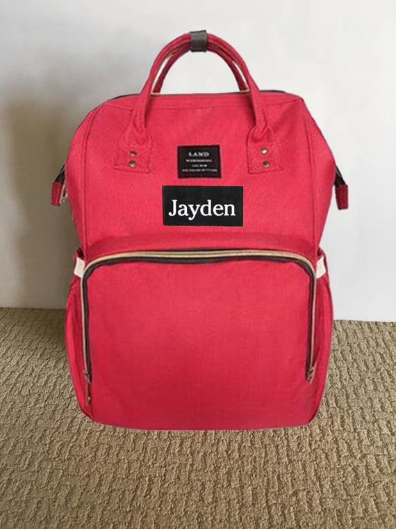 red diaper backpack