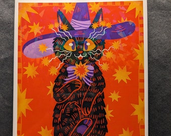 May include: A black cat wearing a purple and white witch hat with a star-shaped design. The cat is holding a star-shaped object in its paws and is surrounded by yellow stars on an orange background.