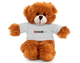 May include: A brown teddy bear wearing a gray t-shirt with the text "HAM44" printed in red and black.