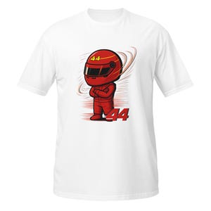 White flat-lay t-shirt showing red chibi driver print, bold "Lewis Hamilton" script and number 44 centered on chest.