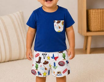 Conjunto de ropa para bebé con temática texana: pantalón corto y camiseta de seda color leche.