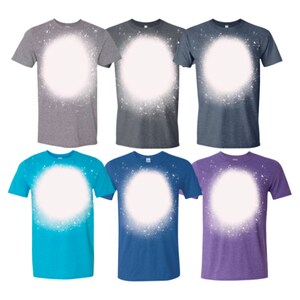 May include: Six t-shirts with a white circle bleached onto the front. The shirts are in various colors including heather gray, teal, purple, and blue.