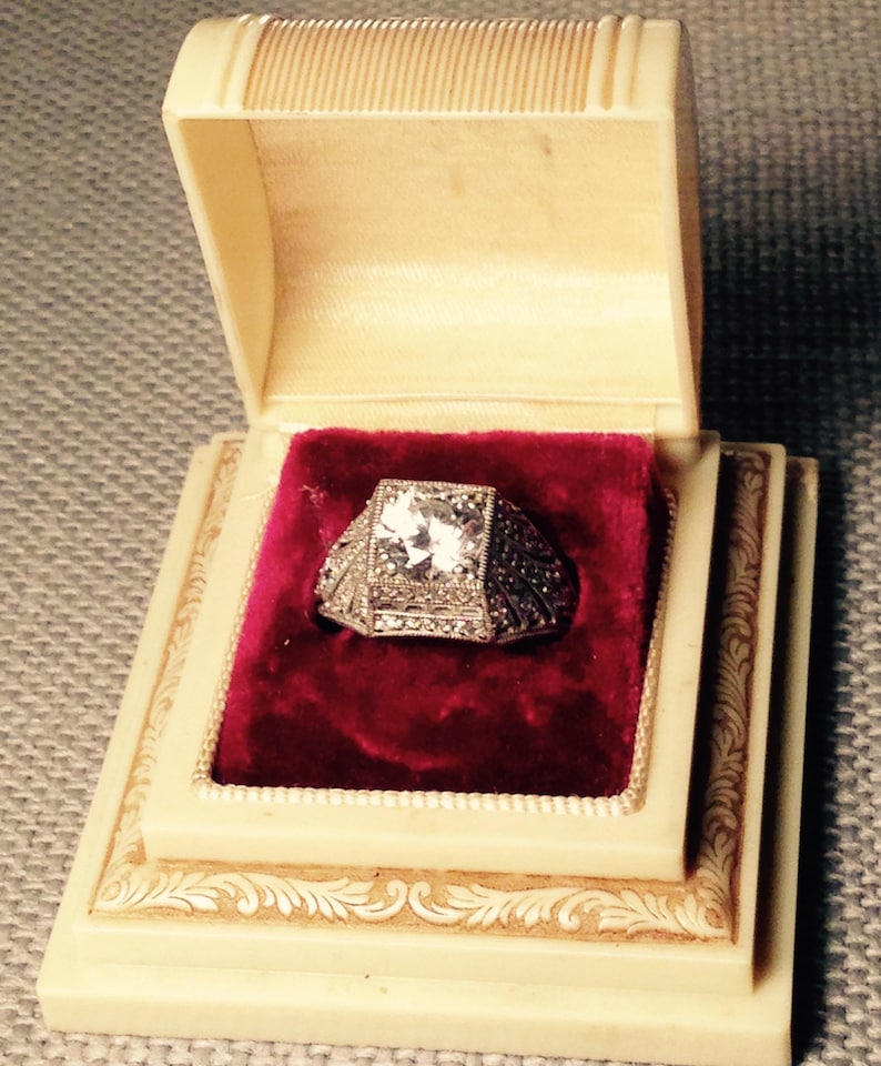Antique Victorian style looking sterling shops silver ring with diamond rock which is a cubic zirconia