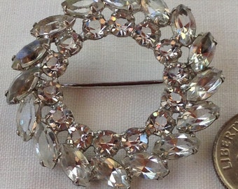 vintage sterling silver wreath brooch in clear stones which is perfect for the holidays hallmark sterling in back. circa 1950's