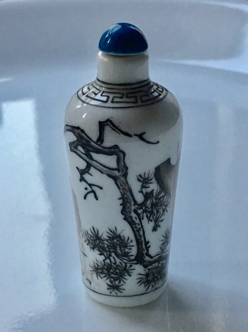 Circa 1960\u2019s Vintage Chinese import hand painted ceramic snuff bottle a scenery of mountains and trees and a big bird In black and white